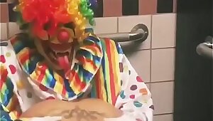 Doll rides clown in bathroom stall