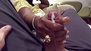 Desi woman gives youthful man handjob on train